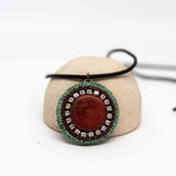 Turquoise Orange Sparkly Round Necklace
