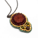 Tribal Orange Shield Necklace